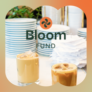 An image of two iced coffee drinks in clear glasses sitting on a counter in front of stacks or white plates is overlaid with a gradient graphic border, a simple floral graphic, and text reading "Bloom Fund".